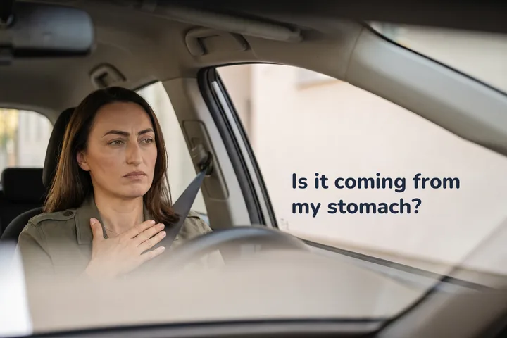 Is it coming from my stomach? — a woman in her parked car mid-morning, a palm flat on her stomach